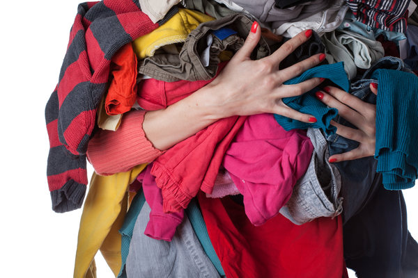 women holding clothes